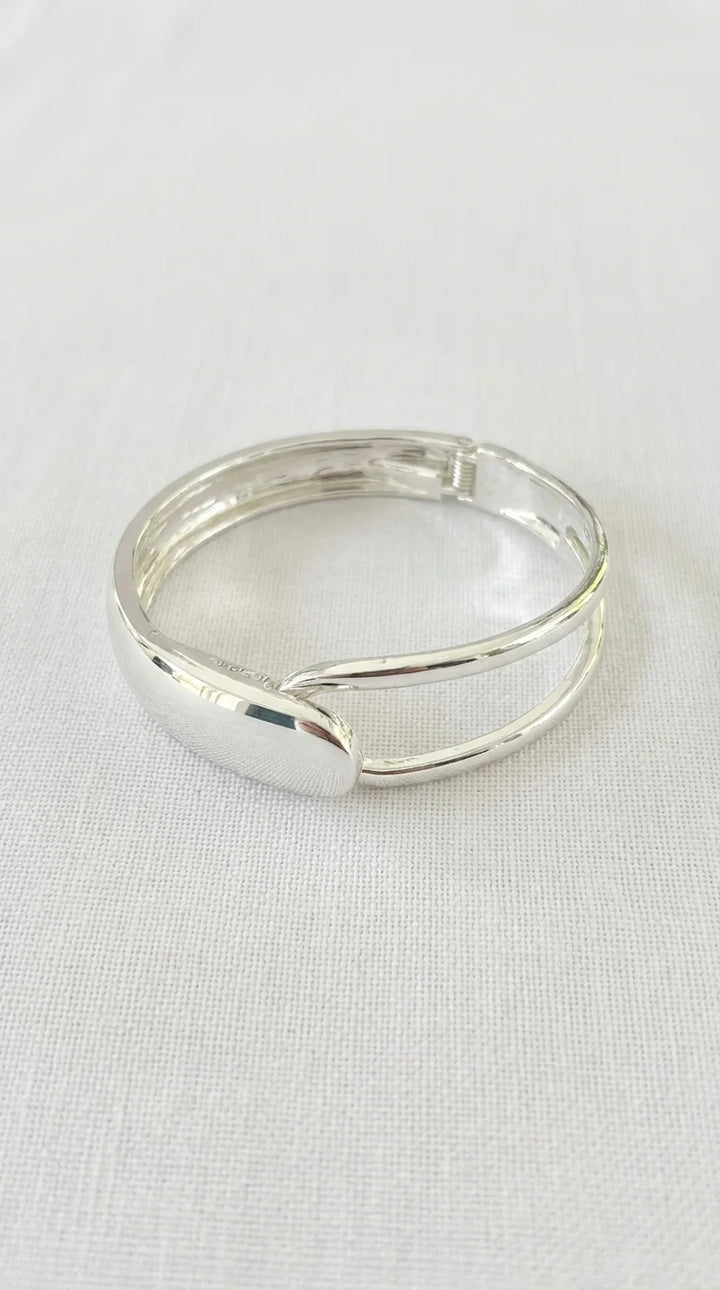Envy Silver looped hinged bangle