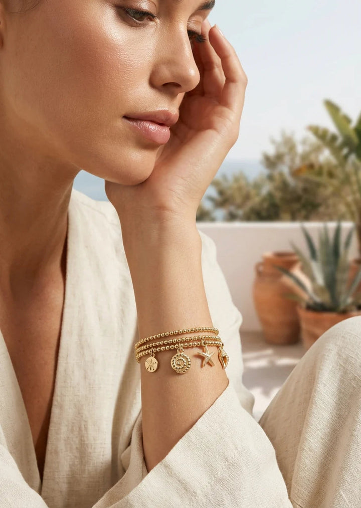 Envy Gold Triple Layered Ocean Inspired Charm Bracelet