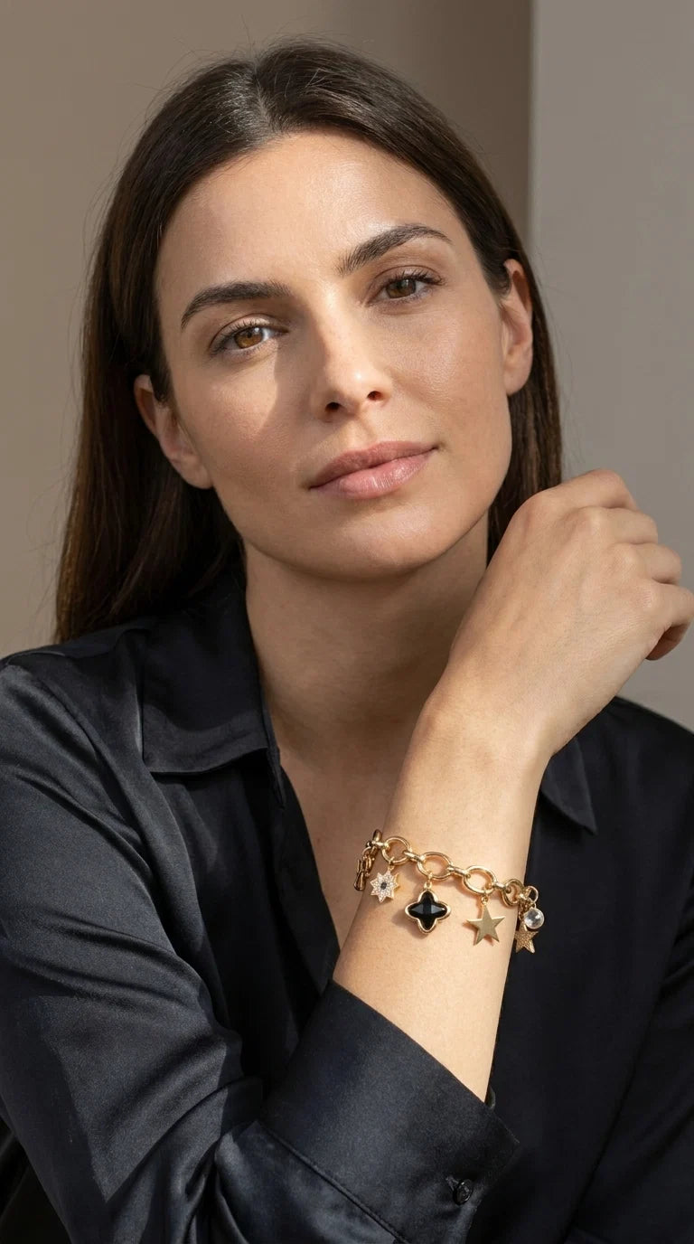 Envy Gold star charm bracelet