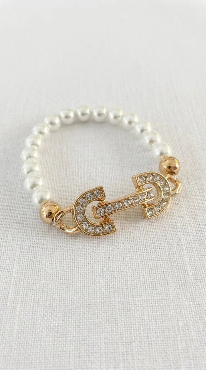 Envy Pearl Horsebit Gold Diamante Bracelet